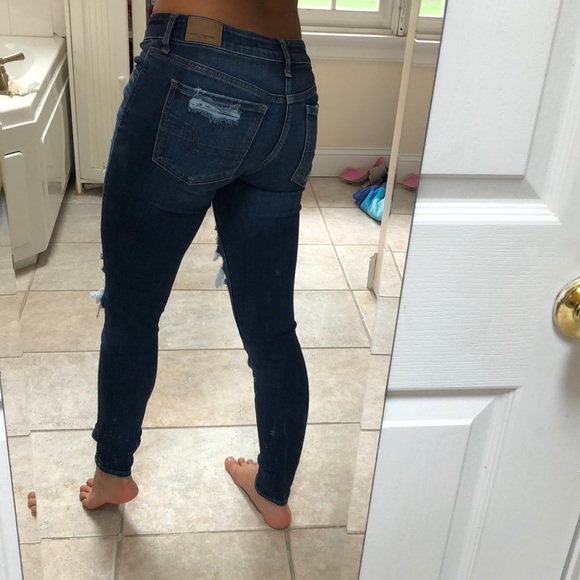 ripped blue jeans - Picture 2 of 3